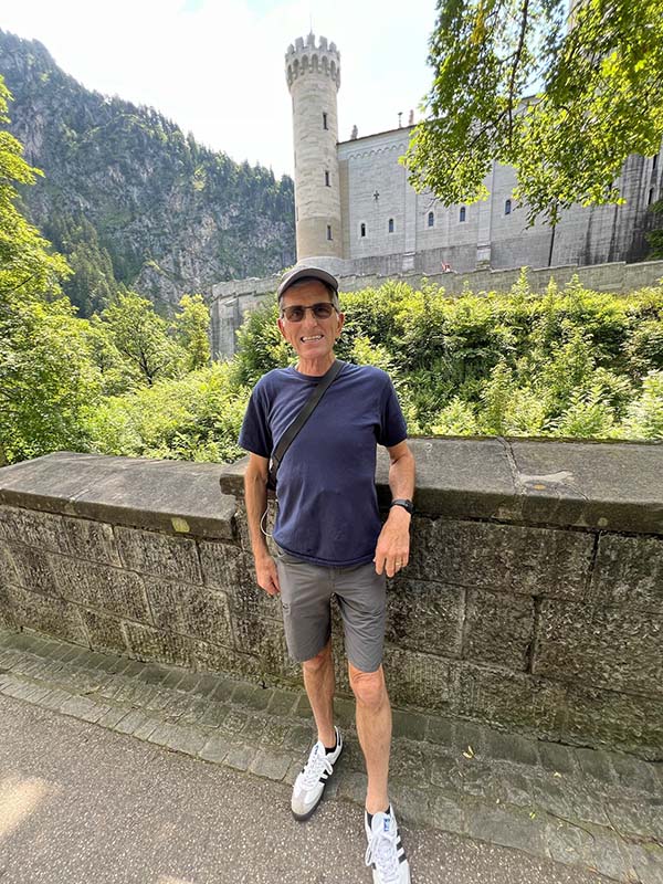 andy in front of castle feeding